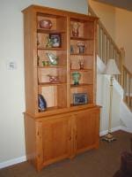Display cabinet with storage