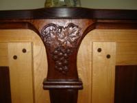 Corner cabinet carving